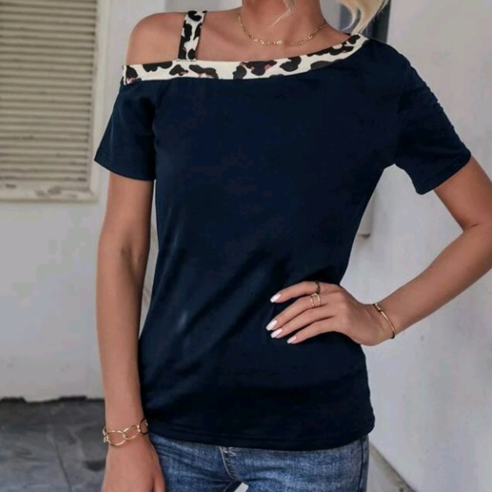 Blue top with leopard print on the top and shoulder